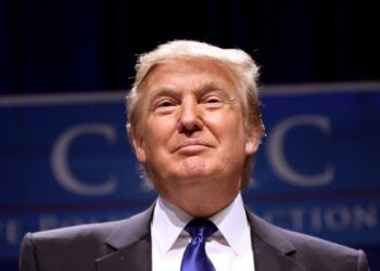 Trump wants the Postal Service to decide who gets a ballot, but 23 states just sued to stop him