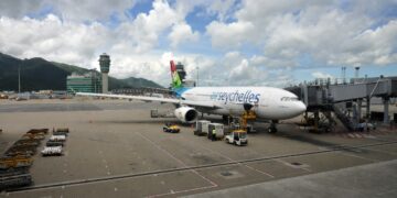 Woman accepts drink from a stranger at the airport, but the intercom cuts in