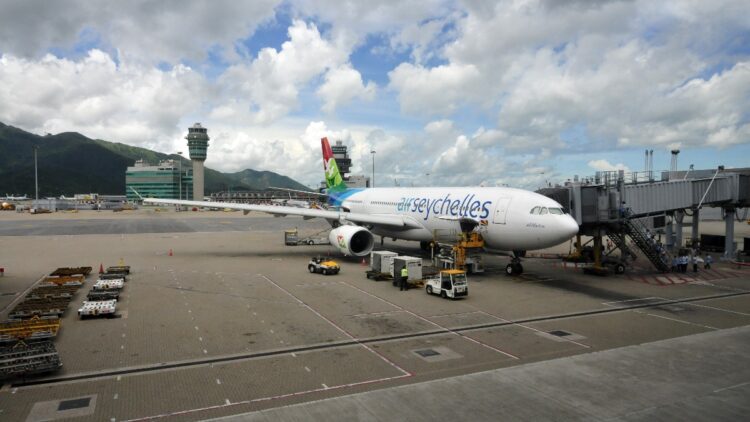 Woman accepts drink from a stranger at the airport, but the intercom cuts in