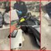 Traveler films TSA agent reading his notebook during bag inspection at Dulles Airport. Traveler tells agent to 'just find the drugs' in video — stills from the TikTok posted by sarahawad__
